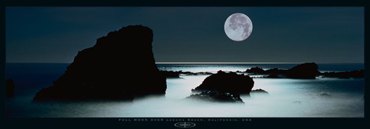 FULL MOON OVER ROCKY SHORELINE